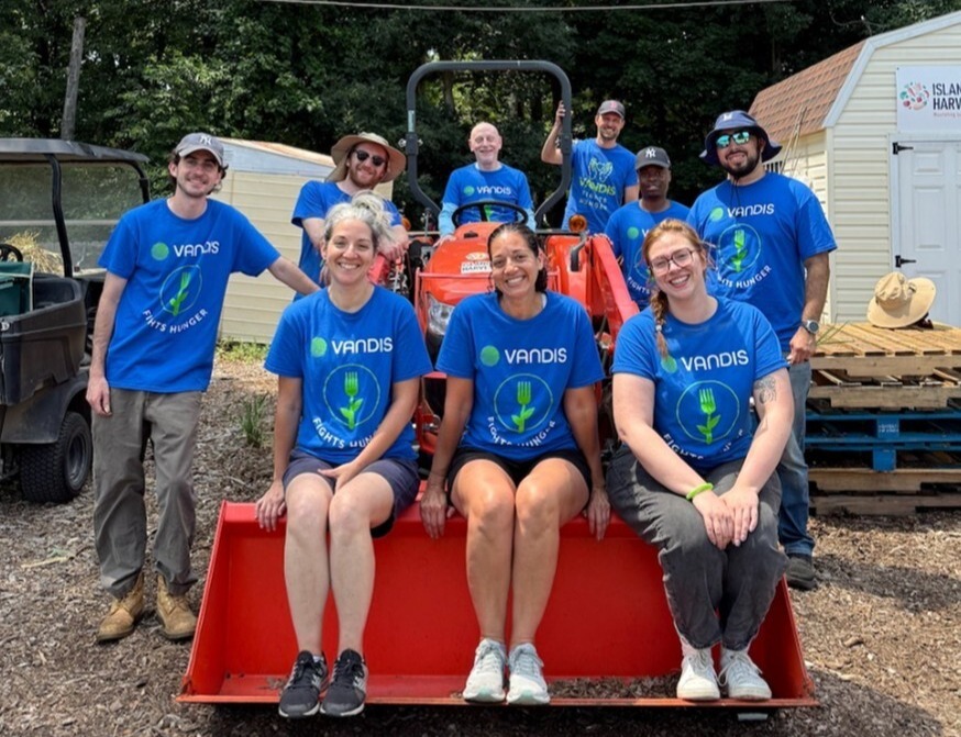 Vandis at the Brentwood Farm volunteering at Island Harvest