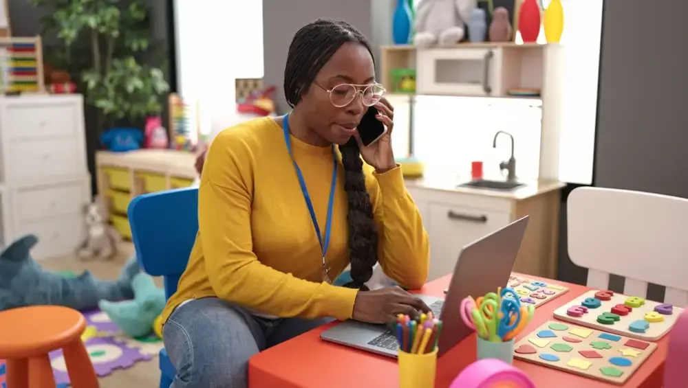 A teacher with wireless devices