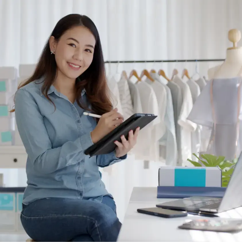 woman with tablet in a store